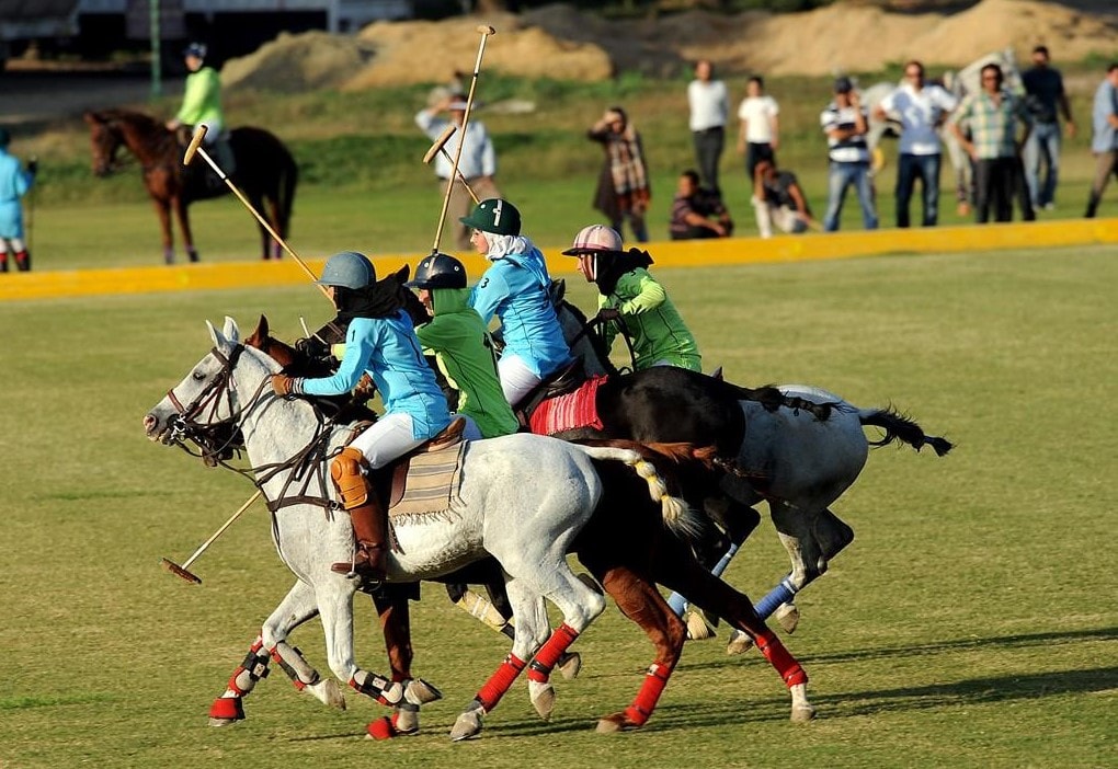 Persian men on horseback playing polo - miniature Stock Photo - Alamy